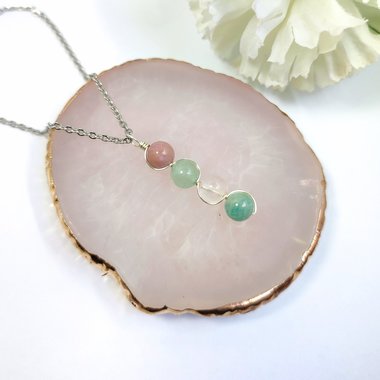Gemstone beaded pendant with rhodochrosite, green aventurine, rose quartz and amazonite.