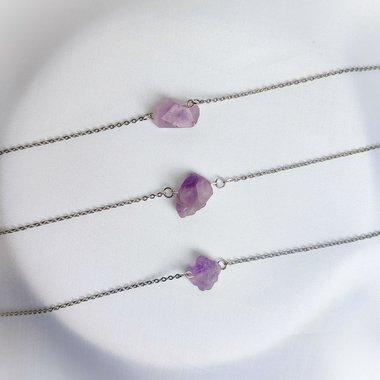 Raw amethyst cluster choker-style necklace with chain.