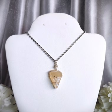 Moonstone wire wrapped pendant with chain or cord.