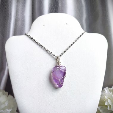 Amethyst wire wrapped pendant in silver