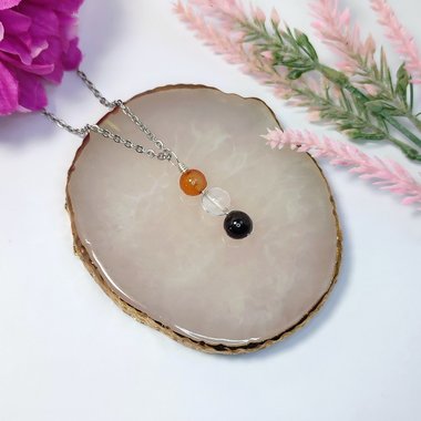 Gemstone pendant for love and relationships with carnelian, rose quartz and garnet beads.