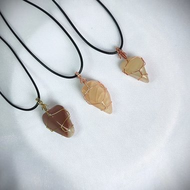 Moonstone wire wrapped pendant in gold, rose gold or copper with cord.