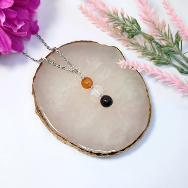 Gemstone pendant for love and relationships with carnelian, rose quartz and garnet beads.